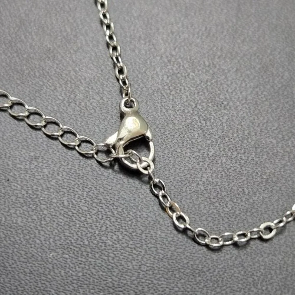Interlocking Mobius Engraved Necklace in‎ Silver (NWOT)